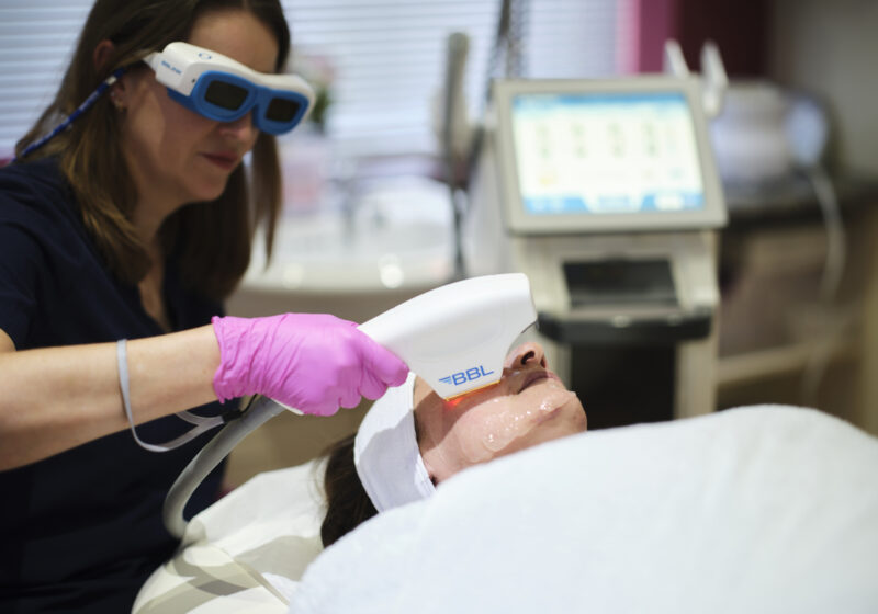 Therapist performing BBL on lady